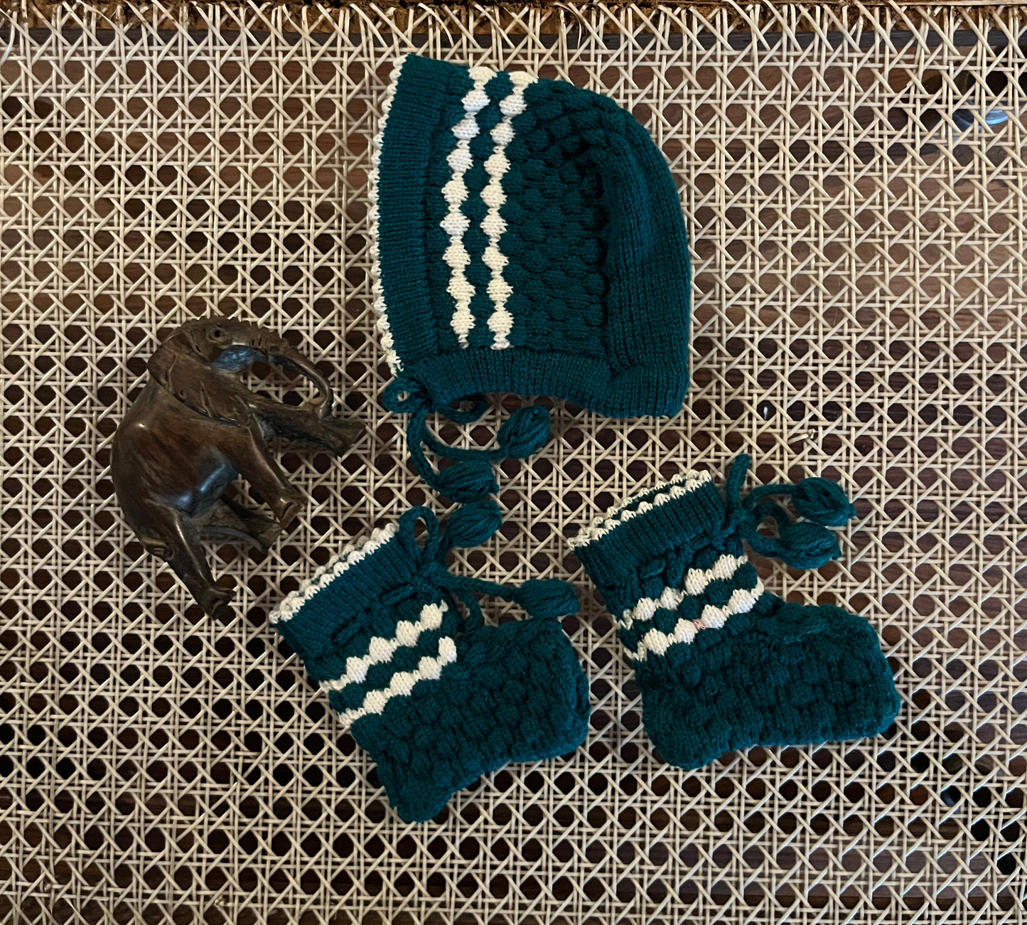 Green baby sweater, cap and booties set by Madhuri Woollens