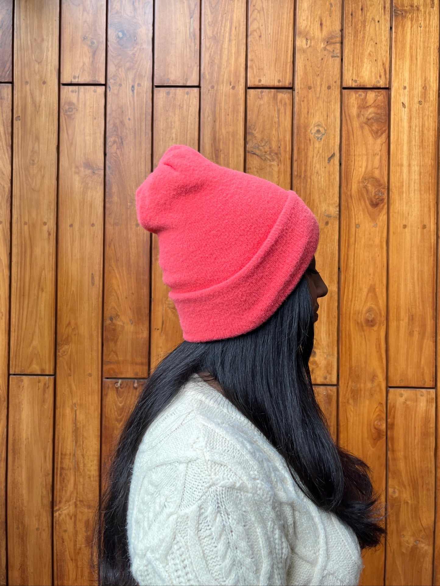 Woman wearing a blush pink fleece beanie winter cap – Madhuri Woollens
