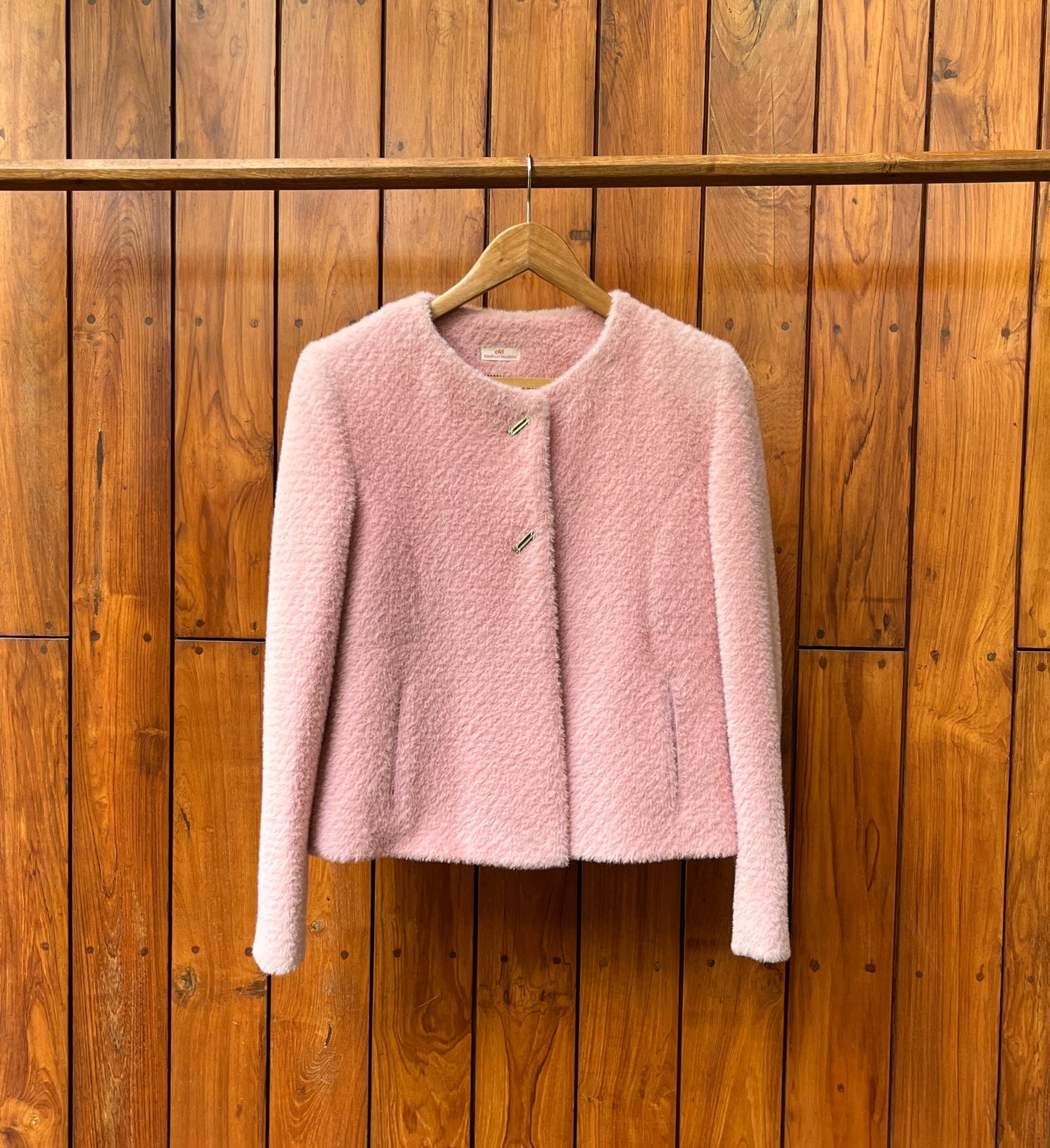 Blush pink textured woolen coat for women with round neckline and front buttons