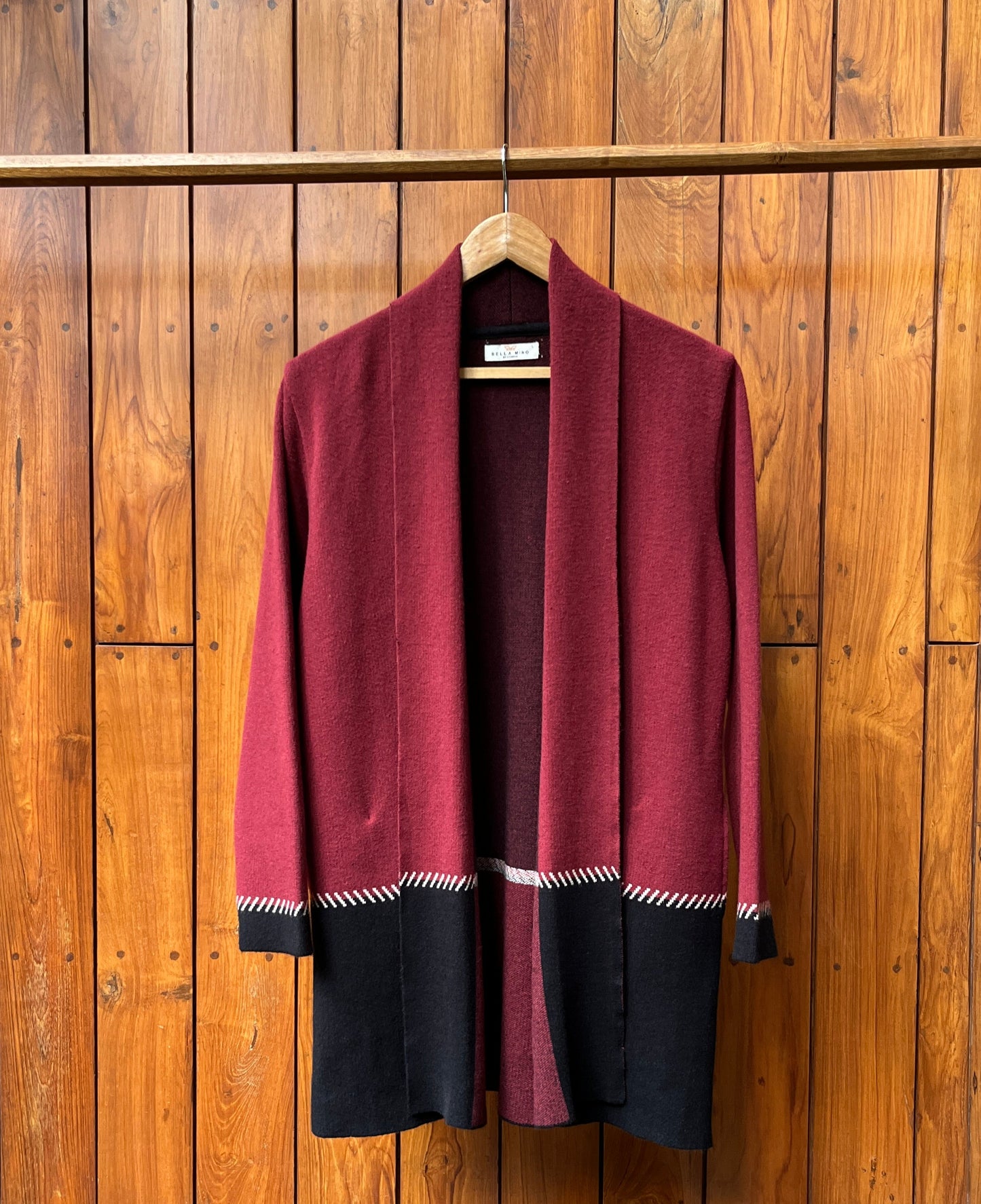 Handcrafted woolen shrug in maroon and black – winter layering by Madhuri Woollens