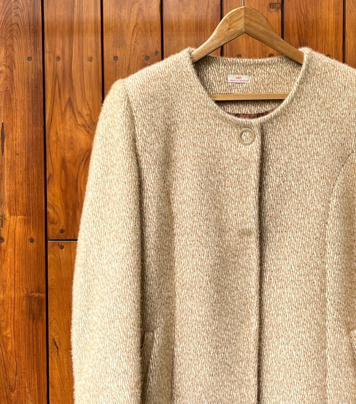 Golden beige long wool coat for women with minimalist design and round neck