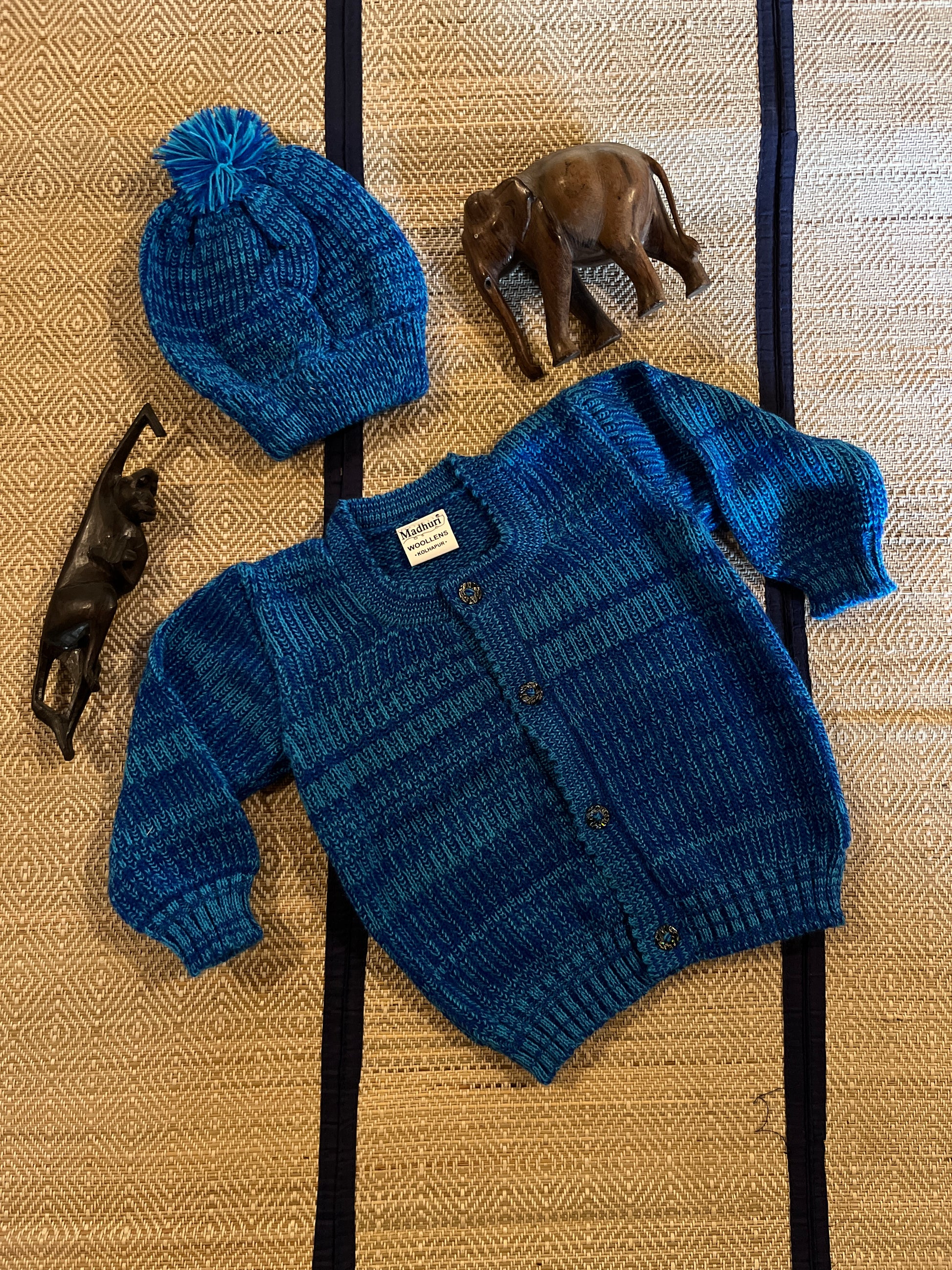 Blue baby woolen cardigan and pom-pom cap set – Madhuri Woollens