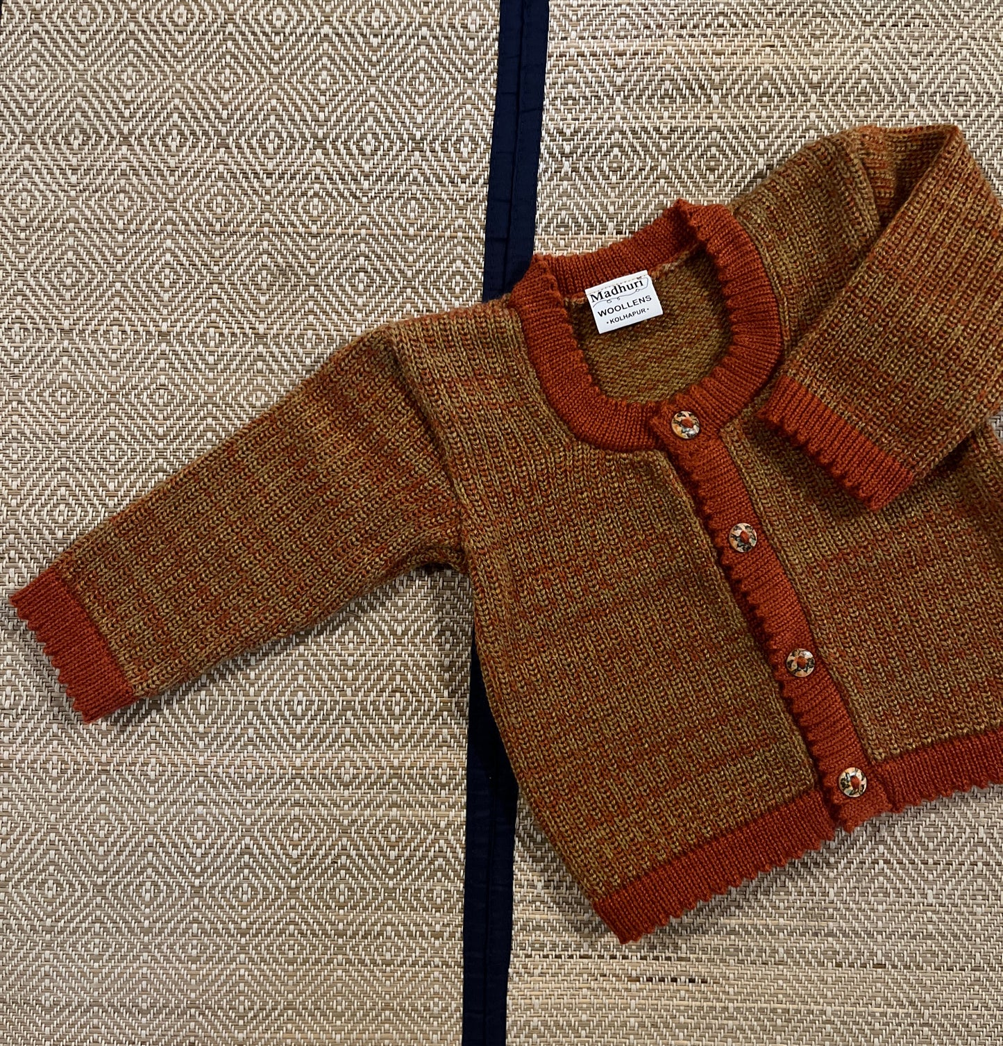 Rust brown baby wool cardigan with matching pom-pom cap – Madhuri Woollens handmade baby winter wear