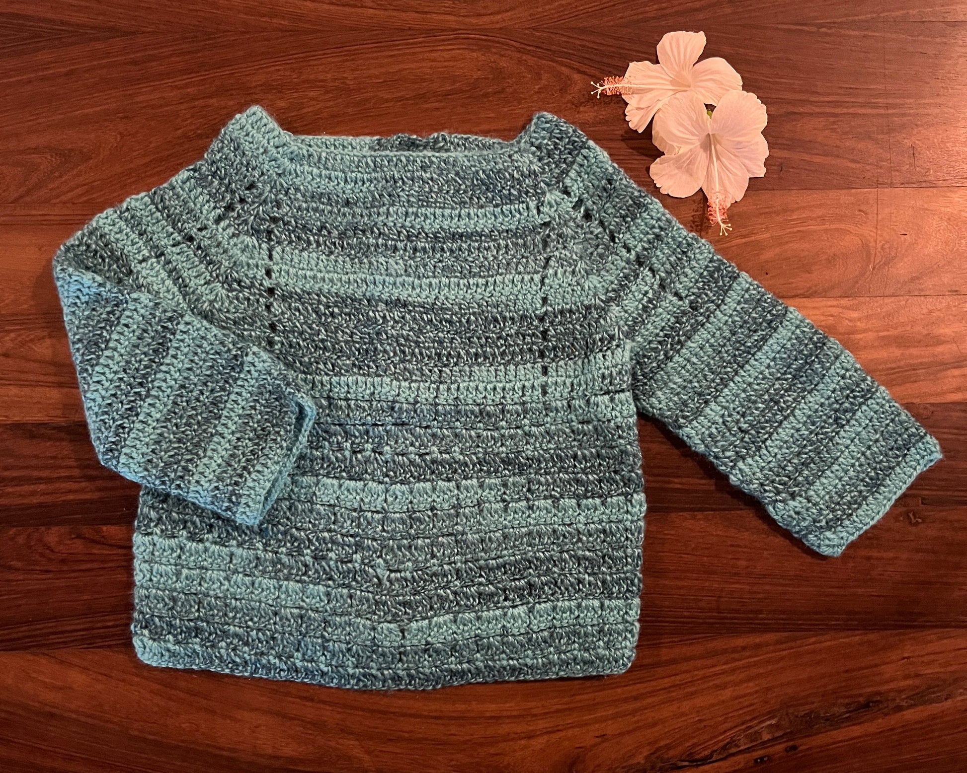Sky blue crochet woollen cardigan for baby – handcrafted winter wear
