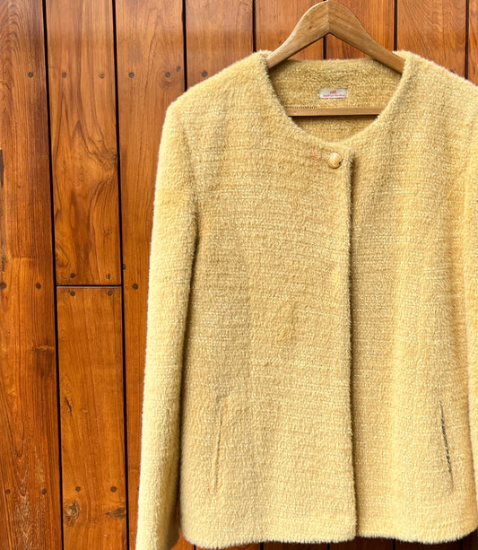 Golden beige woolen coat for women with soft texture and single-button closure