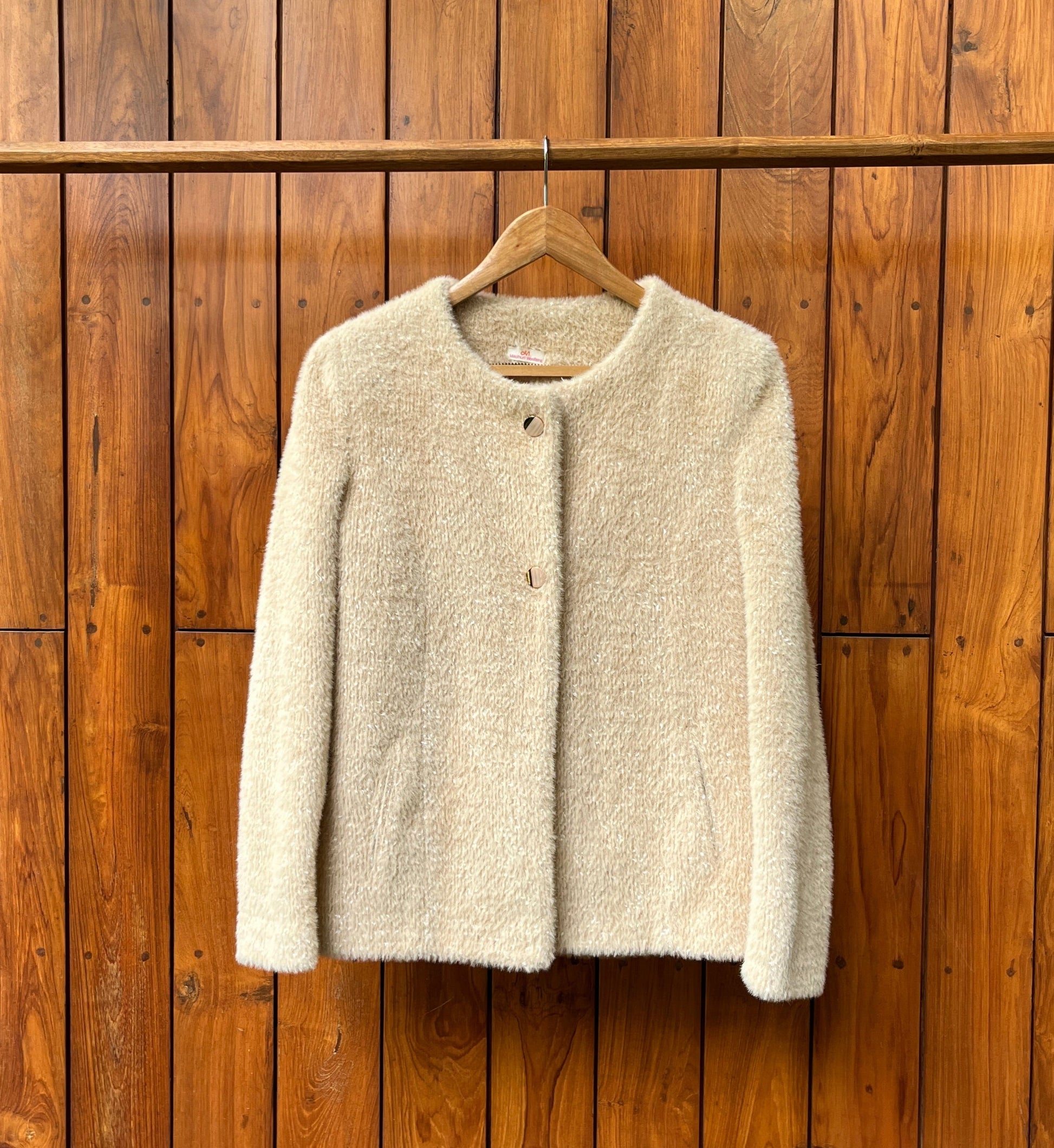 Beige fluffy ladies wool coat with soft texture and button front